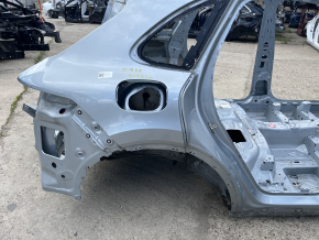 Rear right quarter wing of a 19-26 Porsche Cayenne on the body, silver, dented side member