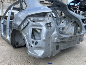 Rear left quarter wing of a 19-26 Porsche Cayenne on the body, silver, dented side member