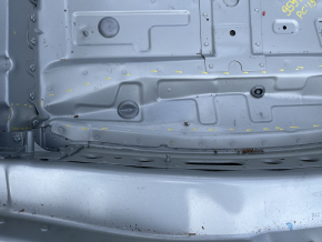 The trunk trough of a Porsche Cayenne 19-23 on the body is dented