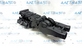 The bare 2-row heater housing for a 19-26 Porsche Cayenne, without a fan, actuators, radiators, or sensors.