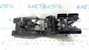 The bare 2-row heater housing for a 19-26 Porsche Cayenne, without a fan, actuators, radiators, or sensors.