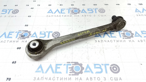 The upper front right control arm of a 19-26 Porsche Cayenne has a torn silent block.