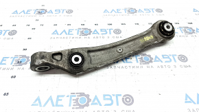 The lower front left control arm of a 19-26 Porsche Cayenne has a torn silent block.
