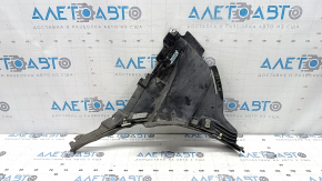 Right front bumper guard for Porsche Cayenne 19-23 is dented and torn.