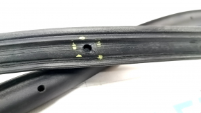 The rear right door seal of a 2021 Ford Bronco Sport has torn fasteners.