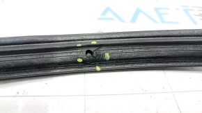 The rear right door seal of a 2021 Ford Bronco Sport has torn fasteners.