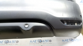 Bare rear bumper for Nissan Rogue Sport 19-22 with parking sensors, black, scratches, bump, cracked mount, broken mount