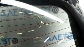 The trunk door is bare with glass, Nissan Rogue Sport 17-22 black G41, scratches on the glass.