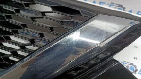Nissan Rogue Sport 20-22 radiator grille without a chamber, plastic has turned white, cracked, chips, scratches, non-factory holes