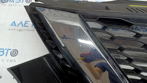 Nissan Rogue Sport 20-22 radiator grille without a chamber, plastic has turned white, cracked, chips, scratches, non-factory holes