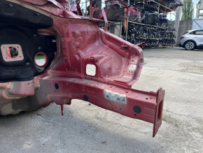 Front left quarter panel of a Kia Sportage 20-22 on the body, red, dented pillar