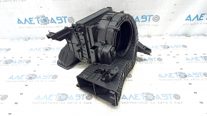 The bare heater housing of a Kia Sportage 18-22 without a fan, actuator, or resistor.