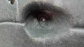 The right underbody protection of the Ford Bronco Sport 21-26 is dented.