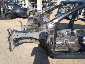 Front left quarter panel of a 17-22 Nissan Rogue Sport, black, dented