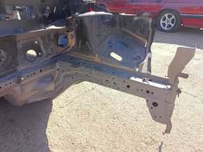 Front left quarter panel of a 17-22 Nissan Rogue Sport, black, dented