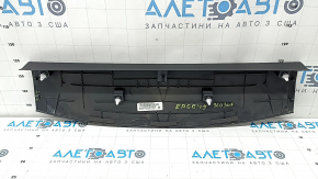 Upper center trunk door trim for Ford Edge 15-24 is black, the fastener is dented, the plastic is whitened