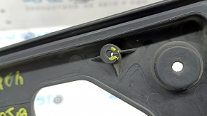 Honda CRV 20-22 front license plate area with scratches and cracks in the mountings