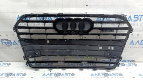 Complete radiator grille for an Audi A6 C7 16-18, with a "quattro" emblem, gloss black + chrome, for parking sensors, chrome chipped, non-factory holes, bumps, chips, broken fasteners