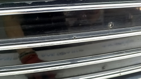 Complete radiator grille for an Audi A6 C7 16-18, with a "quattro" emblem, gloss black + chrome, for parking sensors, chrome chipped, non-factory holes, bumps, chips, broken fasteners