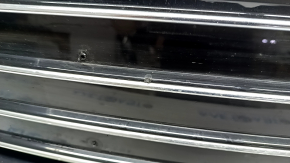 Complete radiator grille for an Audi A6 C7 16-18, with a "quattro" emblem, gloss black + chrome, for parking sensors, chrome chipped, non-factory holes, bumps, chips, broken fasteners