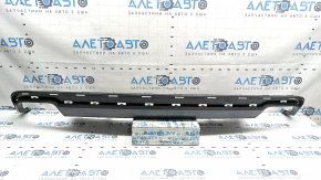 The rear bumper lip of the Audi A6 C7 16-18 restyling s-line is gray, scratches, cracked fasteners, broken fastener, chips