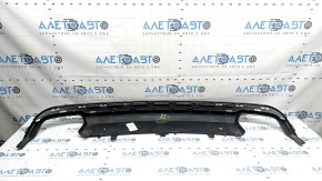 The rear bumper lip of the Audi A6 C7 16-18 restyling s-line is gray, scratches, cracked fasteners, broken fastener, chips