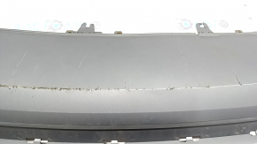 The rear bumper lip of the Audi A6 C7 16-18 restyling s-line is gray, scratches, cracked fasteners, broken fastener, chips