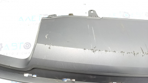 The rear bumper lip of the Audi A6 C7 16-18 restyling s-line is gray, scratches, cracked fasteners, broken fastener, chips