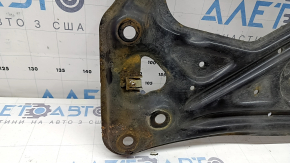 The front subframe strut bar on an Audi A6 C7 12-18 is rusty.