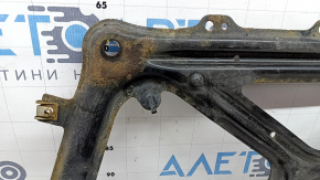 The front subframe strut bar on an Audi A6 C7 12-18 is rusty.