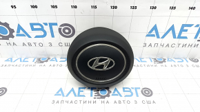 Black steering wheel airbag for the driver's Hyundai Tucson 2022-2026, rusty squib, stains on the chrome