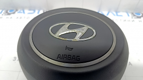 Black steering wheel airbag for the driver's Hyundai Tucson 2022-2026, rusty squib, stains on the chrome