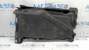 The rear left underbody protection of the Audi A6 C7 12-18 is pressed and worn.