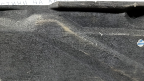 The rear left underbody protection of the Audi A6 C7 12-18 is pressed and worn.