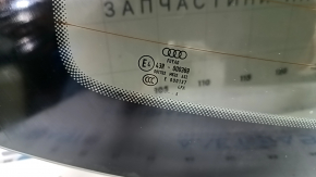 The rear window of an Audi A6 C7 12-18 has a broken heating wire, and is not factory tinted.