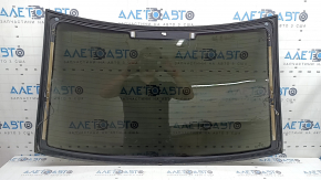 The rear window of an Audi A6 C7 12-18 has a broken heating wire, and is not factory tinted.