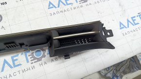 Left front panel trim with air vent deflector for Hyundai Tucson 22-26, black, scratched, sooty