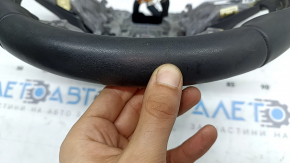 The steering wheel is bare, Hyundai Tucson 22-26, black leather, heated, with a lining, worn, scratches.