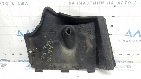 The front right underbody protection of the Audi A6 C7 12-18 is worn and torn.