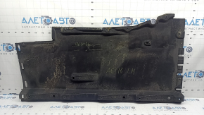 The left underbody protection of the Audi A6 C7 12-18 is torn and worn.