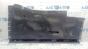 The left underbody protection of the Audi A6 C7 12-18 is torn and worn.