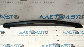 The upper rear left door molding is bent on a Mazda CX-5 17-24.