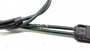 The hood release cable on the front of a Mercedes GLC 16-22 has torn insulation.