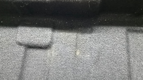 The Mercedes GLC 20-22 trunk liner is worn and needs cleaning.