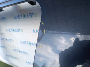 Metal roof for a 2020 Mitsubishi Outlander with panoramic windows, sawed off, dents, and bumps.