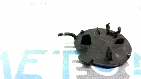 The towing hook plug for the front bumper of a VW Tiguan 18-21 has a broken fastening.