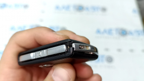 Volvo XC90 16-26 keyless entry key, 4 buttons, chipped, broken latch, scratches
