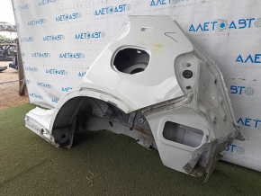 The quarter wing of the rear left Mercedes GLA 15-20 is sawn off, white, dented, bump