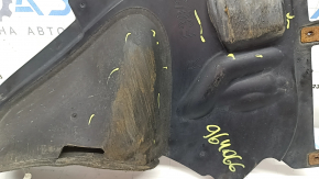 The lower part of the front right fender liner of a BMW 3 F30 12-18 is worn out.