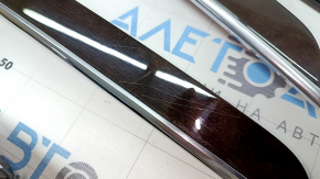 A set of interior trims for the Volvo XC90 16-25 in Classic wood / Flame birch, Bowers & Wilkins, with illumination, scratches